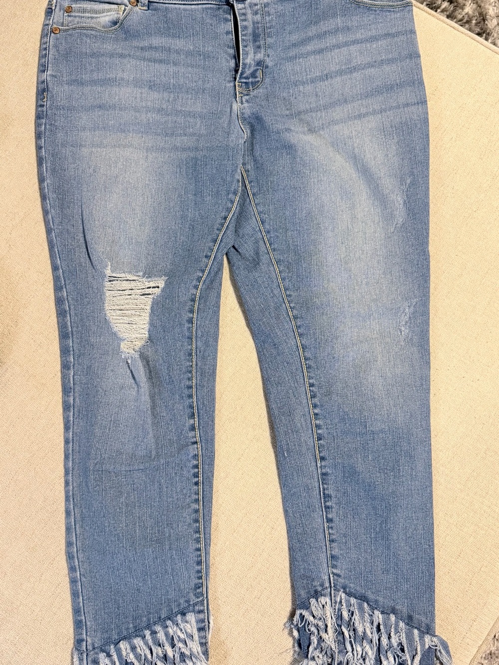 Women’s Light Blue Distressed Fringe Hem Jeans